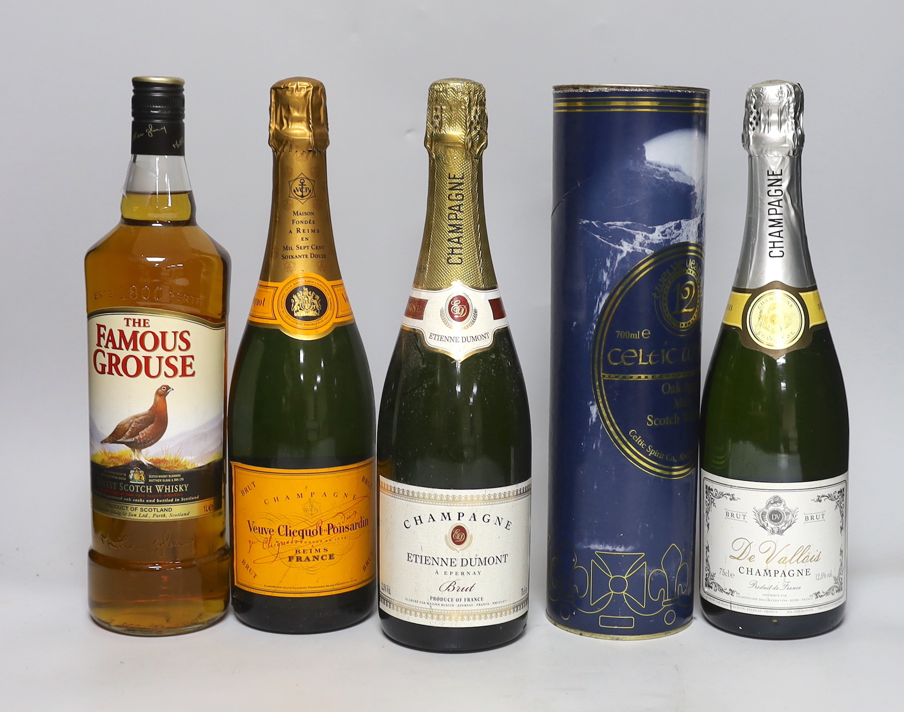 Two bottles of whisky and six bottles of champagne